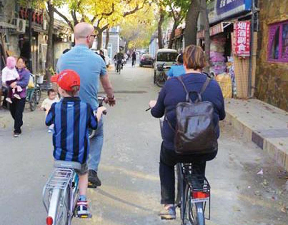 Maak een leuke fietstour door de hutongs.